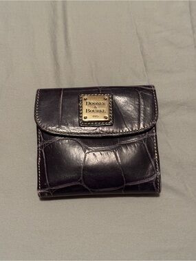 A Dooney & Bourke Croc-Embossed Compact Wallet with Gold Plaque